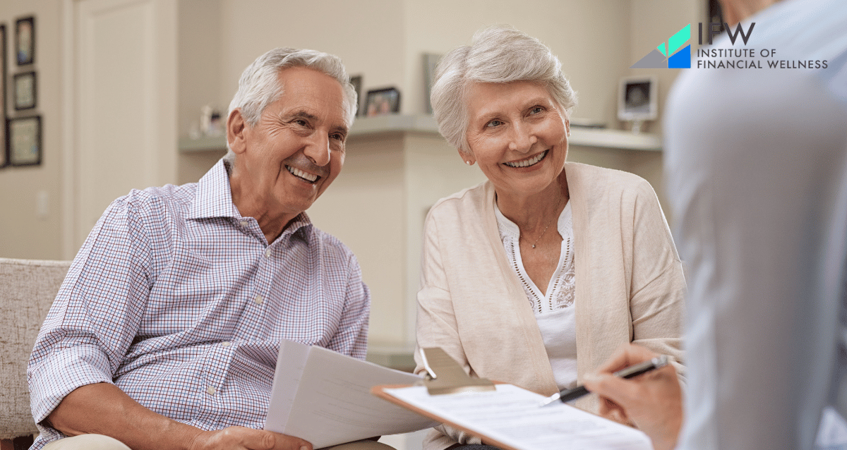 A financial advisor helping a couple plan for their retirement investments and goals