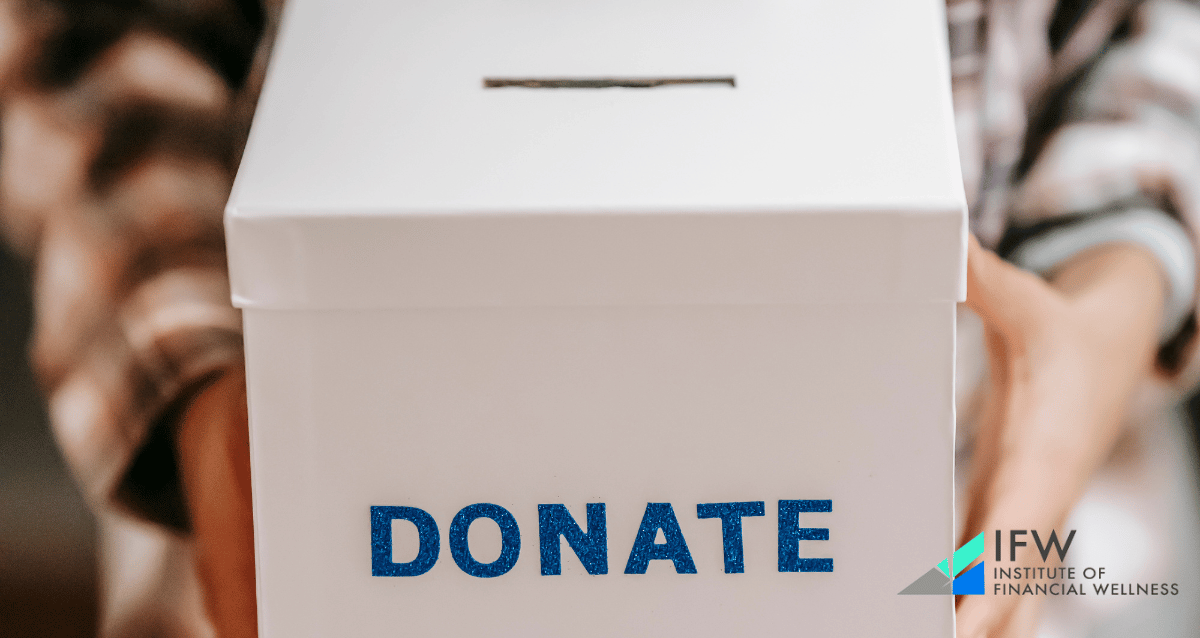 A man holding a box for donations.