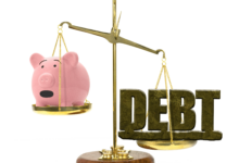 Debt on a scale with piggy bank (1)