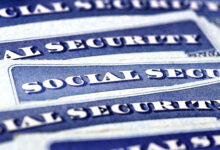 Closeup,Detail,Of,Several,Social,Security,Cards,Representing,Finances,And